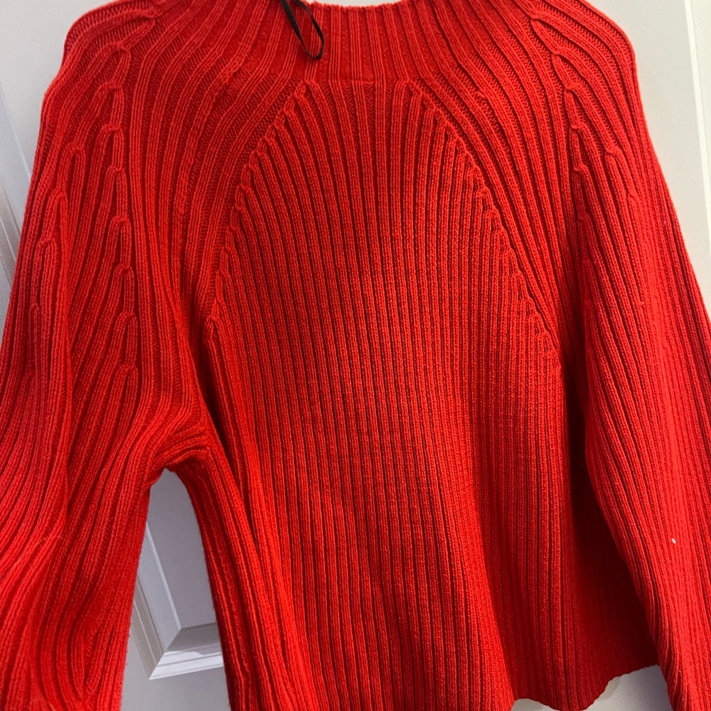 Red sweater size XL